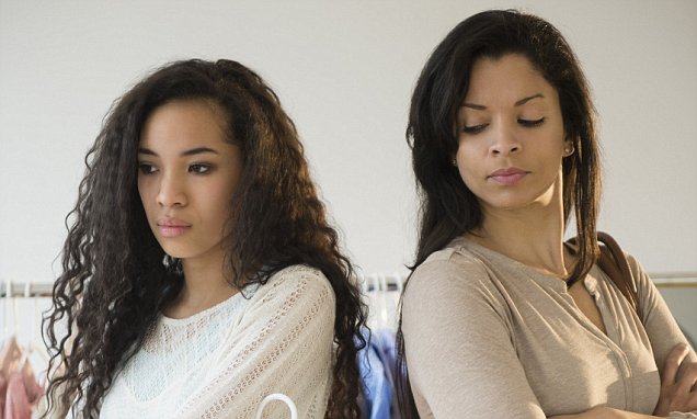 Mother and daughter arguing in store